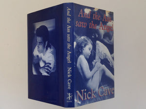 NICK CAVE - And the Ass Saw the Angel . Londen / Leiden: Black Spring Press, 1989. 1st Edition / Second Printing