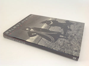 HELMUT NEWTON - World without Men - first English edition - London: Quartet Books, 1984.