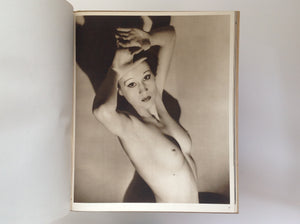 JOHN EVERARD. Adam's Fifth Rib - a Collection of Photographic Studies of Nude By John Everard with a Foreword By the Editor of "the Bystander" . Londen: Chapman & Hall, 1936. Second Edition. 318 x 263 Mm . Hard Cover Cloth in a Box. Fine / Very Good. Pages unnumbered, one page of text in English by R.S.Hooper, foreword.
