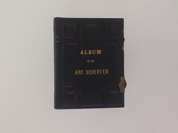 ARY SCHEFFER. Album De Ary Scheffer . Ary Scheffer, 1st Edition. 155 x 120 Mm . Hard Cover. Fine Photograph Album with 20 original photographs (ca 80 x 50 mm) . 10 pages, (ca 2 mm thick) gilt edged with the photographs in passe partout. Probably in a private binding, no editor or date is mentioned.(ca 1870) The first photograph is a portrait of the artist.