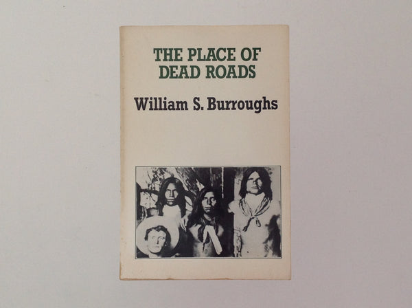 [005414] WILLIAM S. BURROUGHS. The Place of Dead Roads . Londen: John Calder, 1983. 229 x 153 Mm . Paperback. Fine ISBN: 0714540323. 306 pages, text in English. Drawing of a map in B&W. - The Place of Dead Roads by William S. Burroughs very fine copy no crack in spine. 